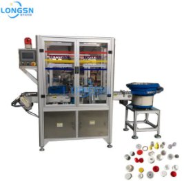 What is a cap assembly machine?