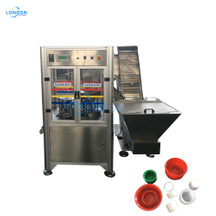 Automatic plastic cap anti-theft ring slitting cutting assembly machine